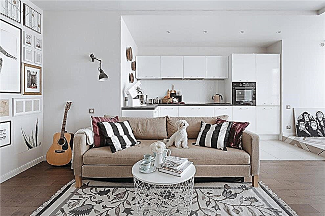 Gabungan sofa krem ​​kanthi gaya interior sing beda